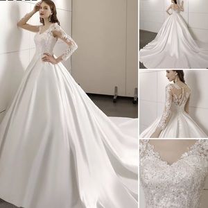 Ivory long sleeve ballgown wedding dress gown